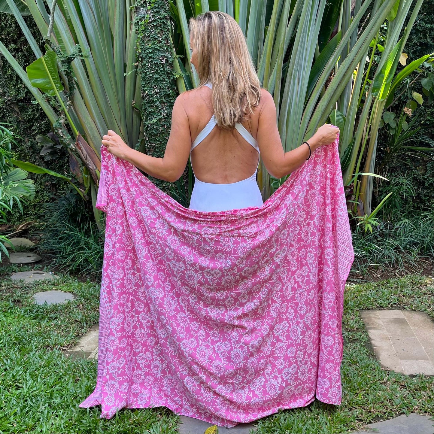 A larger view of tthe pink hibiscus luxe swimsuit wrap
