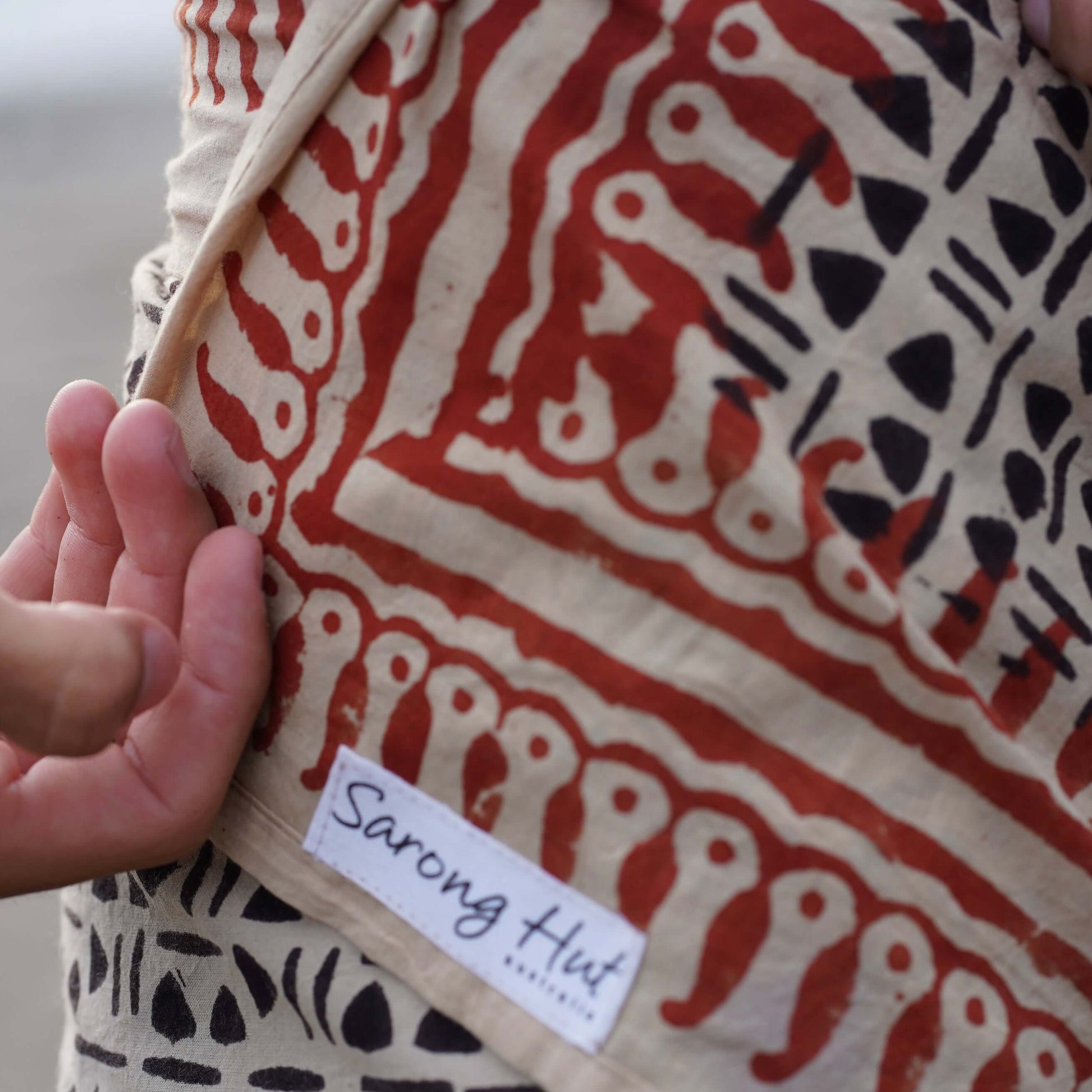 Close-up of batik cotton mens sarong pattern, ideal for warm weather