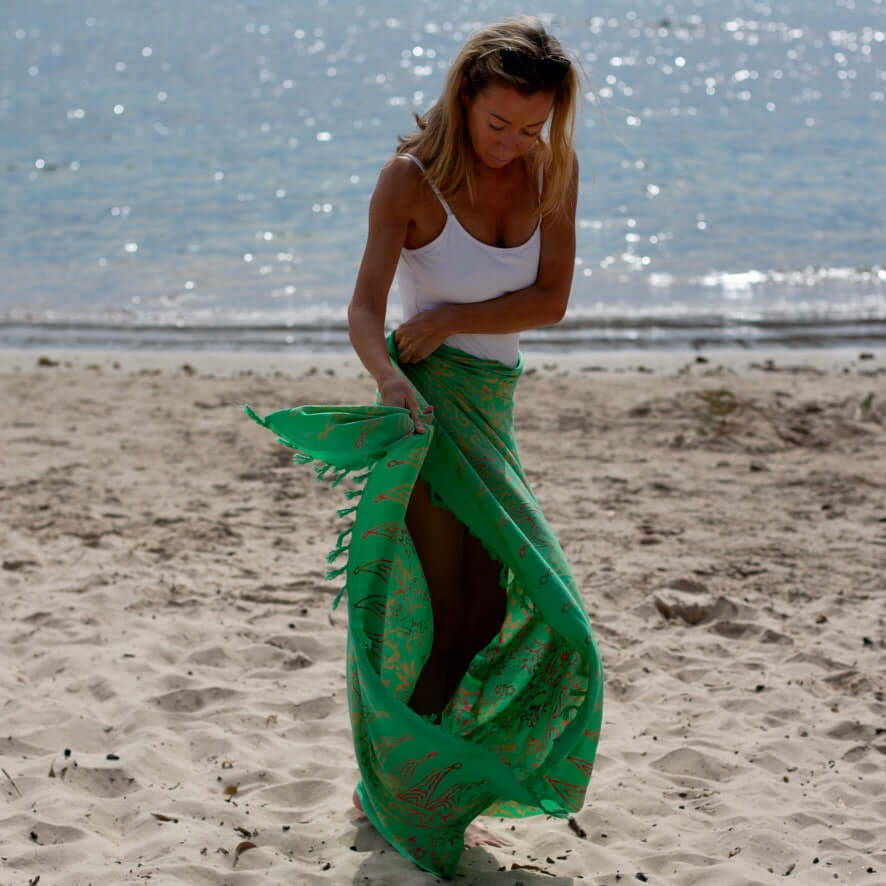 Green body beach wrap sarong on beach in Balmoral Sydney