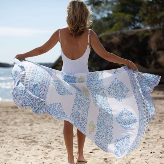 Freedom blue voile sarong beachwear look, photographed outdoors in natural light