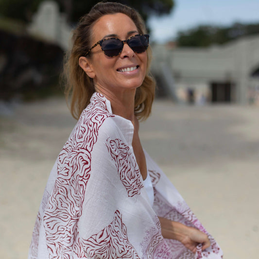 Freedom pink voile sarong beachwear look, photographed outdoors in natural light
