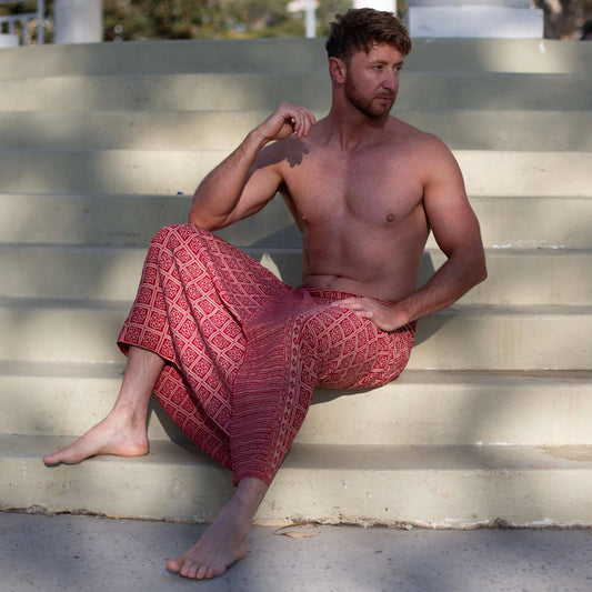Liberation luxe men sarong beachwear look, photographed outdoors in natural light