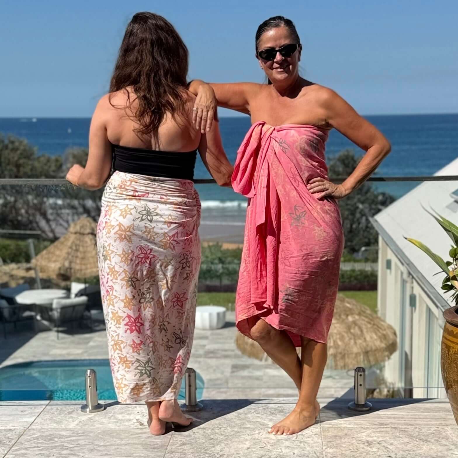 Pareo cream luxe sarong worn as beach cover-up, flowing rayon fabric