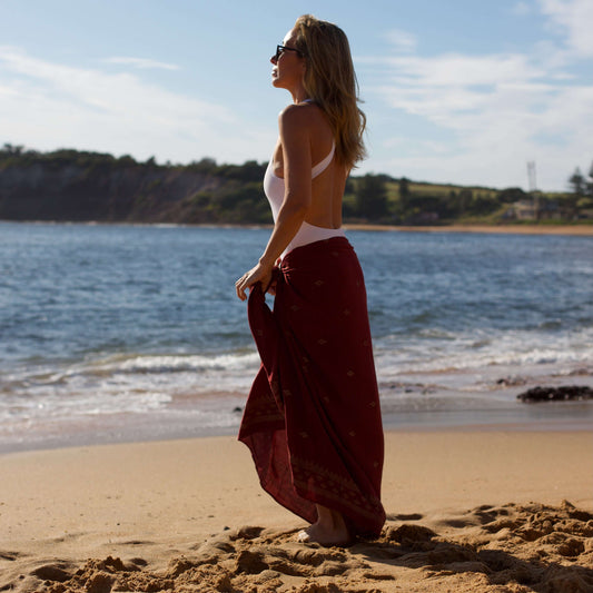 Burgundy Luxe Womens Sarong side view on the beach