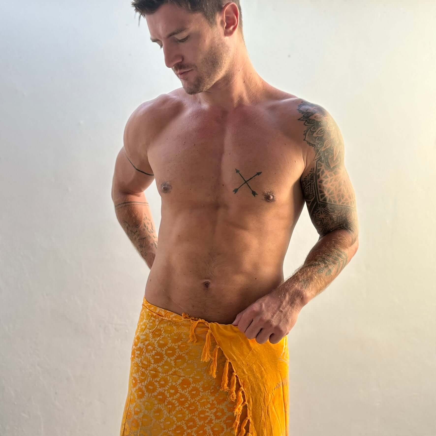 Vibrance Saffron Mens Beach Sarung side torso natural light
