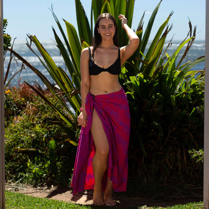 Bright bubbly luxe sarong tied at hip, lightweight rayon by sarong hut
