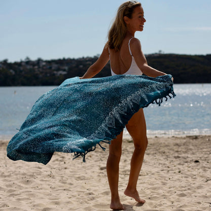 Free spirit teal beach sarong worn as beach cover-up, flowing rayon fabric