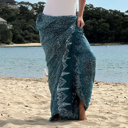 Free spirit teal beach sarong worn as beach cover-up, flowing rayon fabric