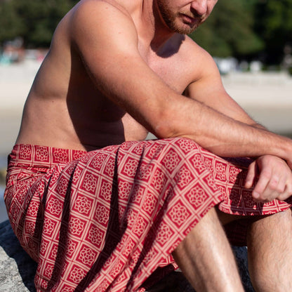 Liberation luxe men sarong worn as beach cover-up, flowing rayon fabric