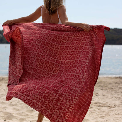 Liberation luxe sarong worn as beach cover-up, flowing rayon fabric