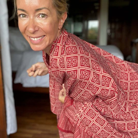 Liberation luxe sarong beachwear look, photographed outdoors in natural light