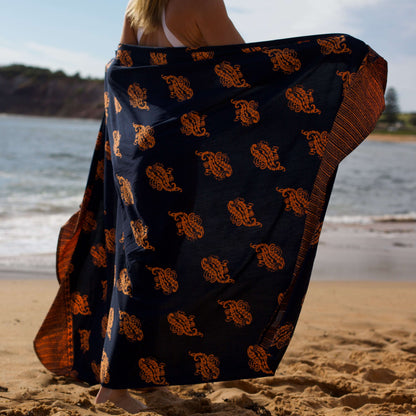 Manly Luxe Women's Sarong fabric swatch on beach
