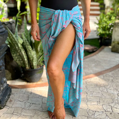 Palm beach luxe sarong worn as beach cover-up, flowing rayon fabric