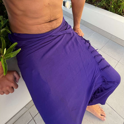 Close-up of purple pop men beach sarong pattern, ideal for warm weather