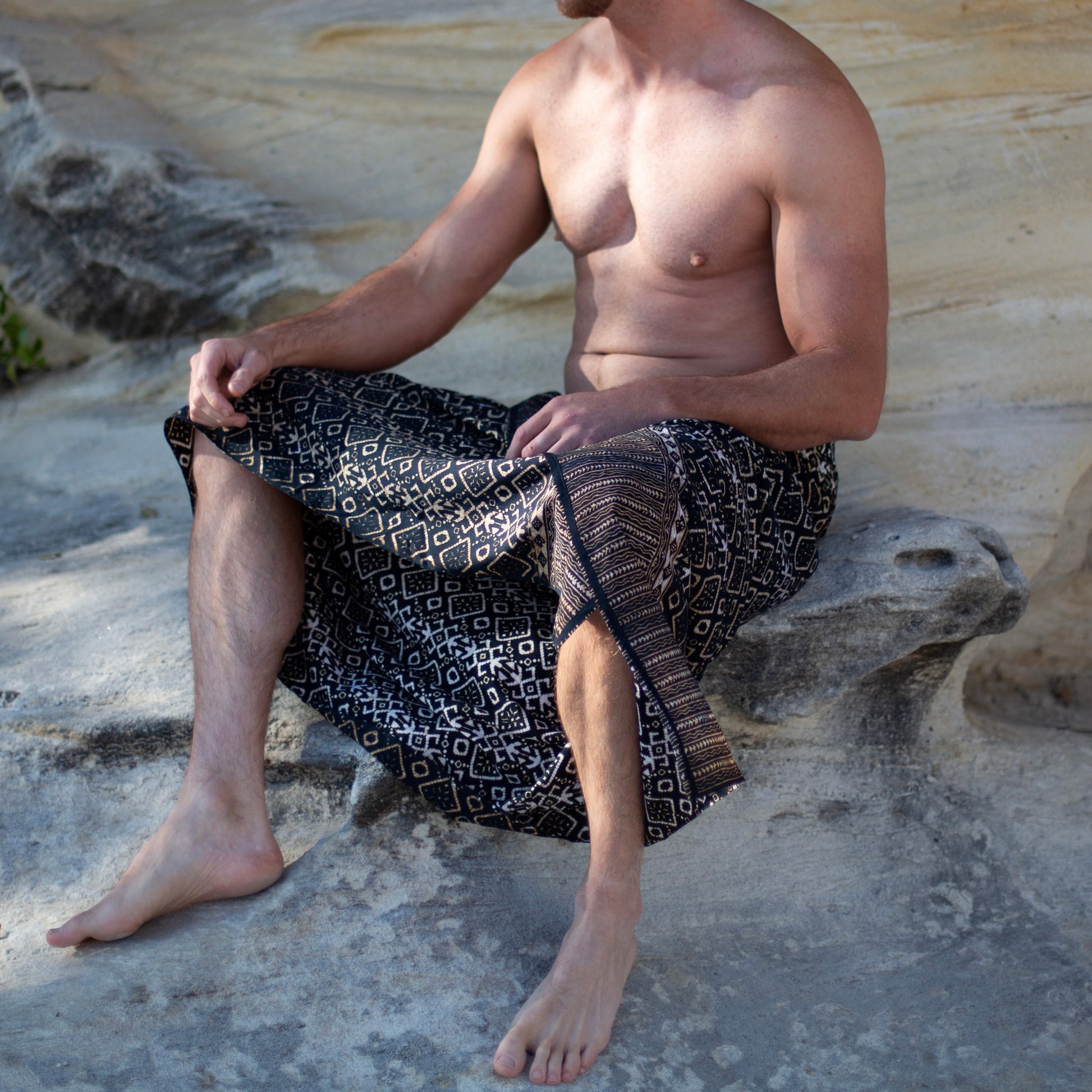 Release luxe mens sarong worn as beach cover-up, flowing rayon fabric