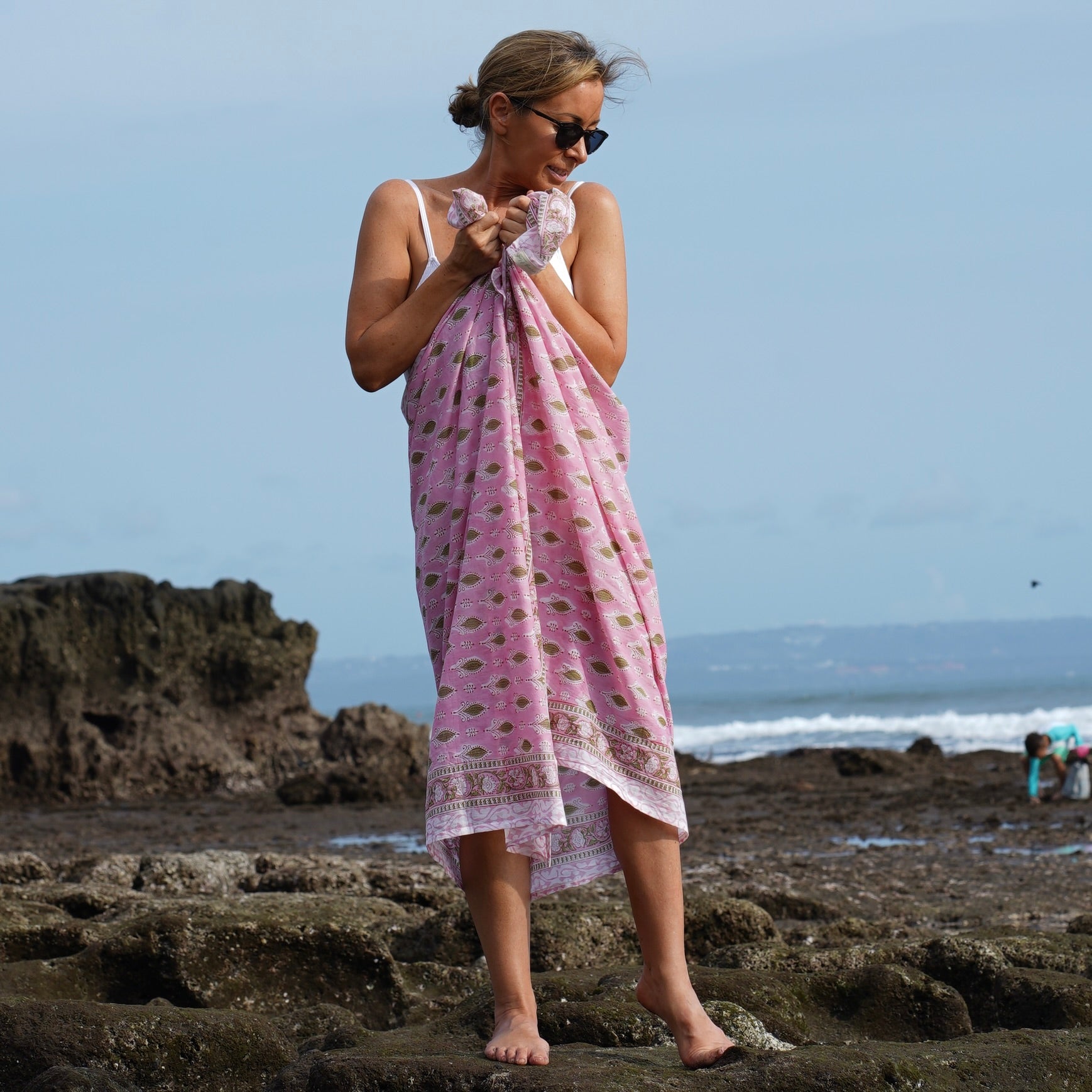 Sierra cotton sarong worn as beach cover-up, flowing rayon fabric