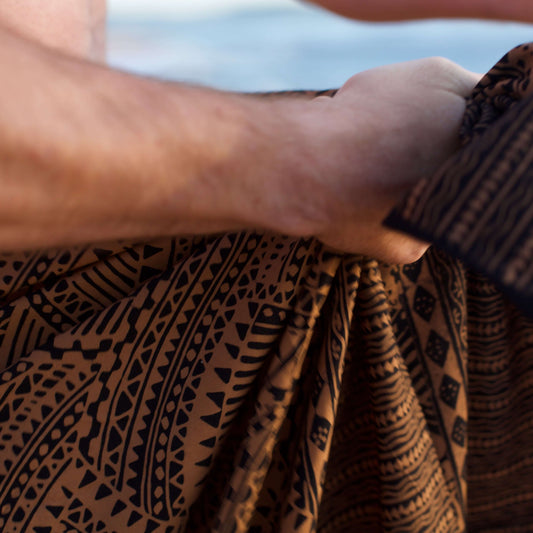 spear fishing mens luxe sarong closeup on sydney beach