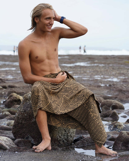 spear fishing mens black and brown luxe sarong man on beach 