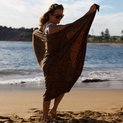 spear fishing womens luxe sarong. model on beach